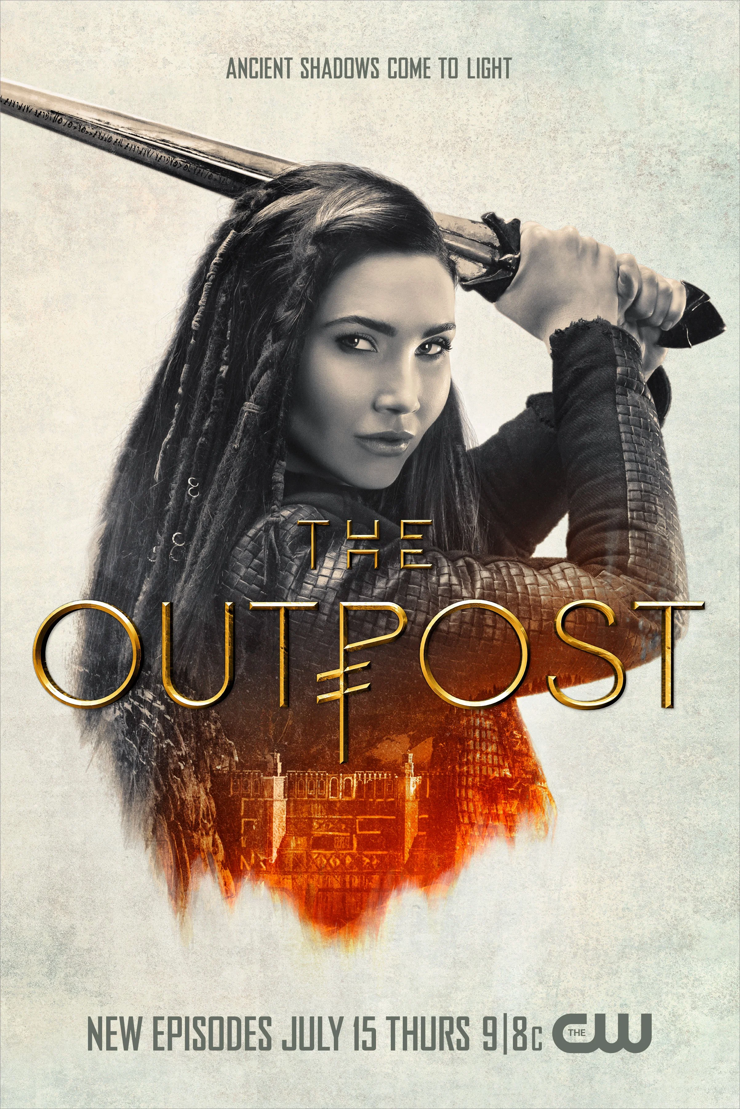 Promotional poster for the TV show 'The Outpost' featuring a woman with long dark braided hair holding a sword above her head, with the tagline 'Ancient shadows come to light.' The poster mentions new episodes premiering on July 15 at 9/8c on The CW.