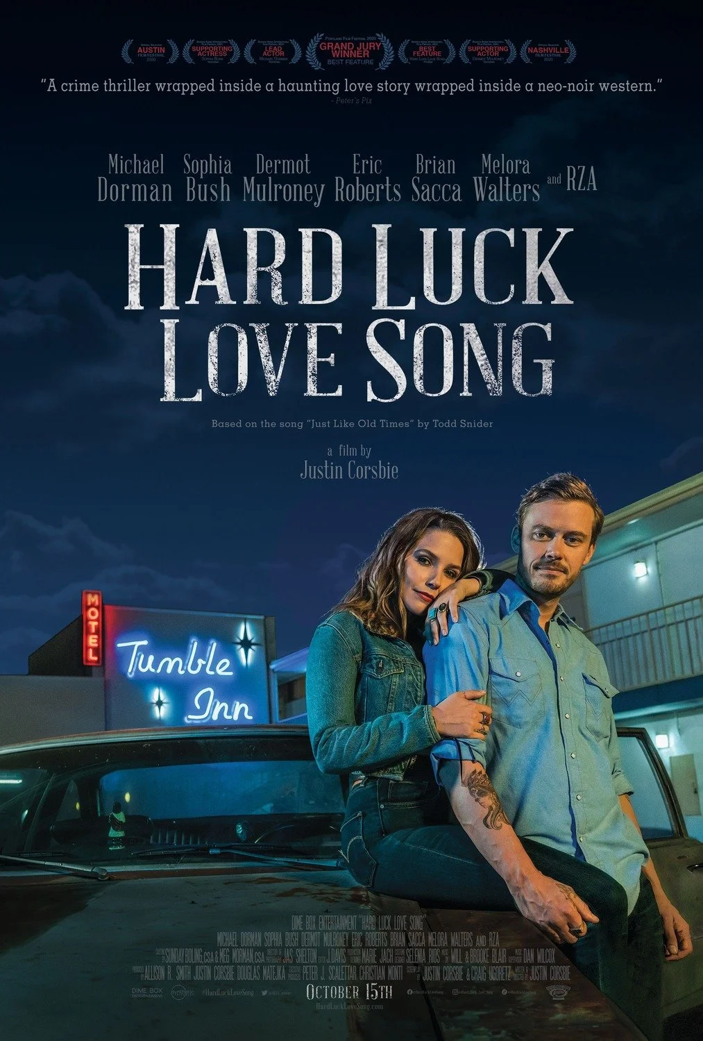 Movie poster for 'Hard Luck Love Song' showing a man and woman leaning on a vintage car in front of a motel with a neon sign that reads 'Tumble Inn' at night, with dark clouds in the sky.