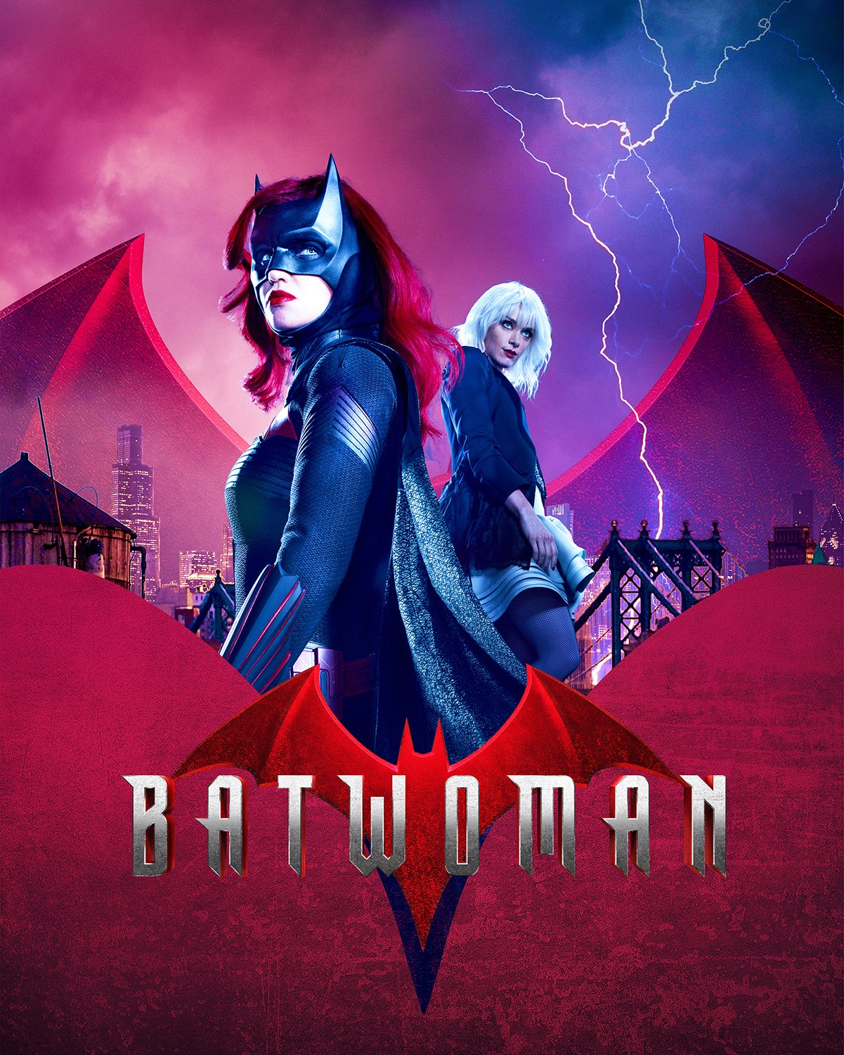 A promotional poster for the movie 'Batwoman' featuring two women in superhero costumes, one with red hair and Batman-like mask, the other with white hair, against a city skyline with lightning and dramatic clouds in the background.
