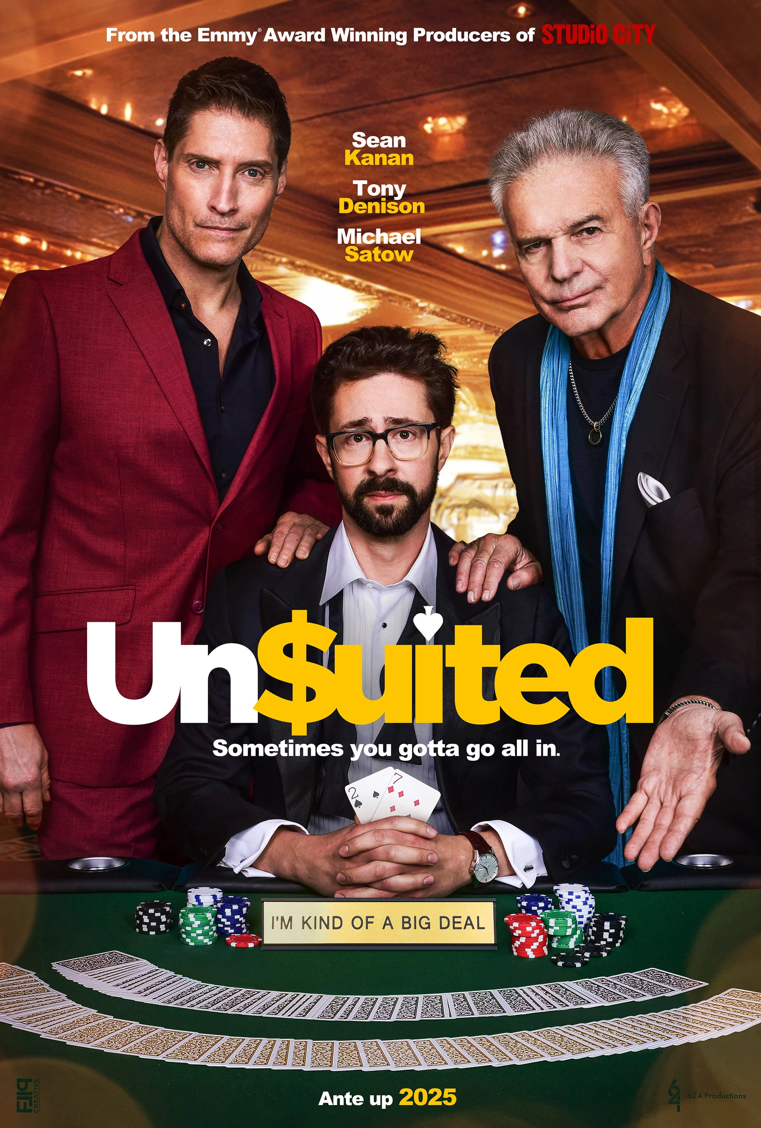 Promotional poster for the movie 'Un$uited' featuring three men at a poker table. The scene includes poker chips, playing cards, and a sign reading 'I'M KIND OF A BIG DEAL.' The film's tagline is 'Sometimes you gotta go all in,' and it is set to rele