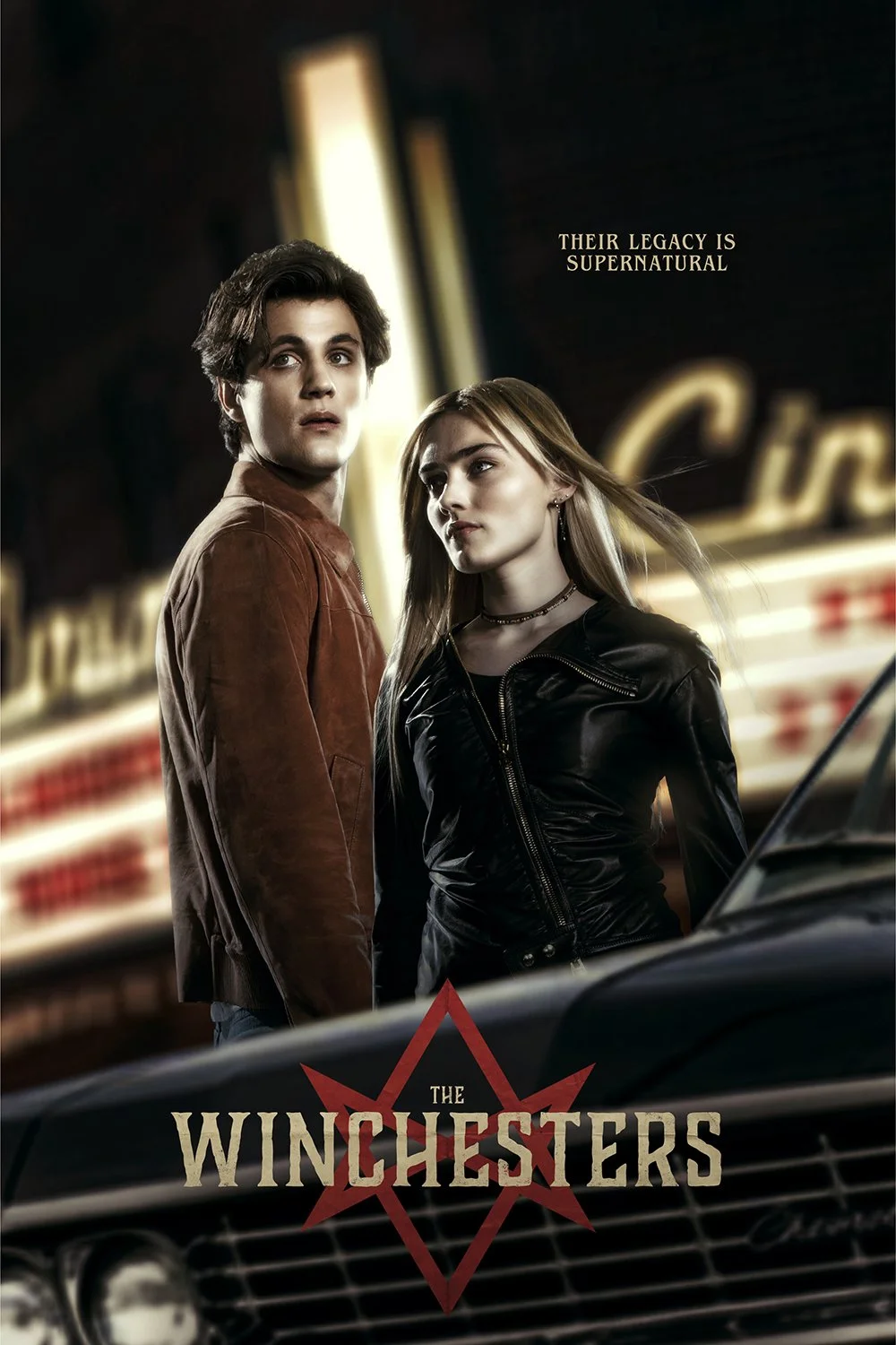 Poster from the series 'The Winchesters' showing a young man and woman standing in front of a neon-lit building, with a vintage car in the foreground. The text reads 'Their legacy is supernatural' and 'The Winchesters'.