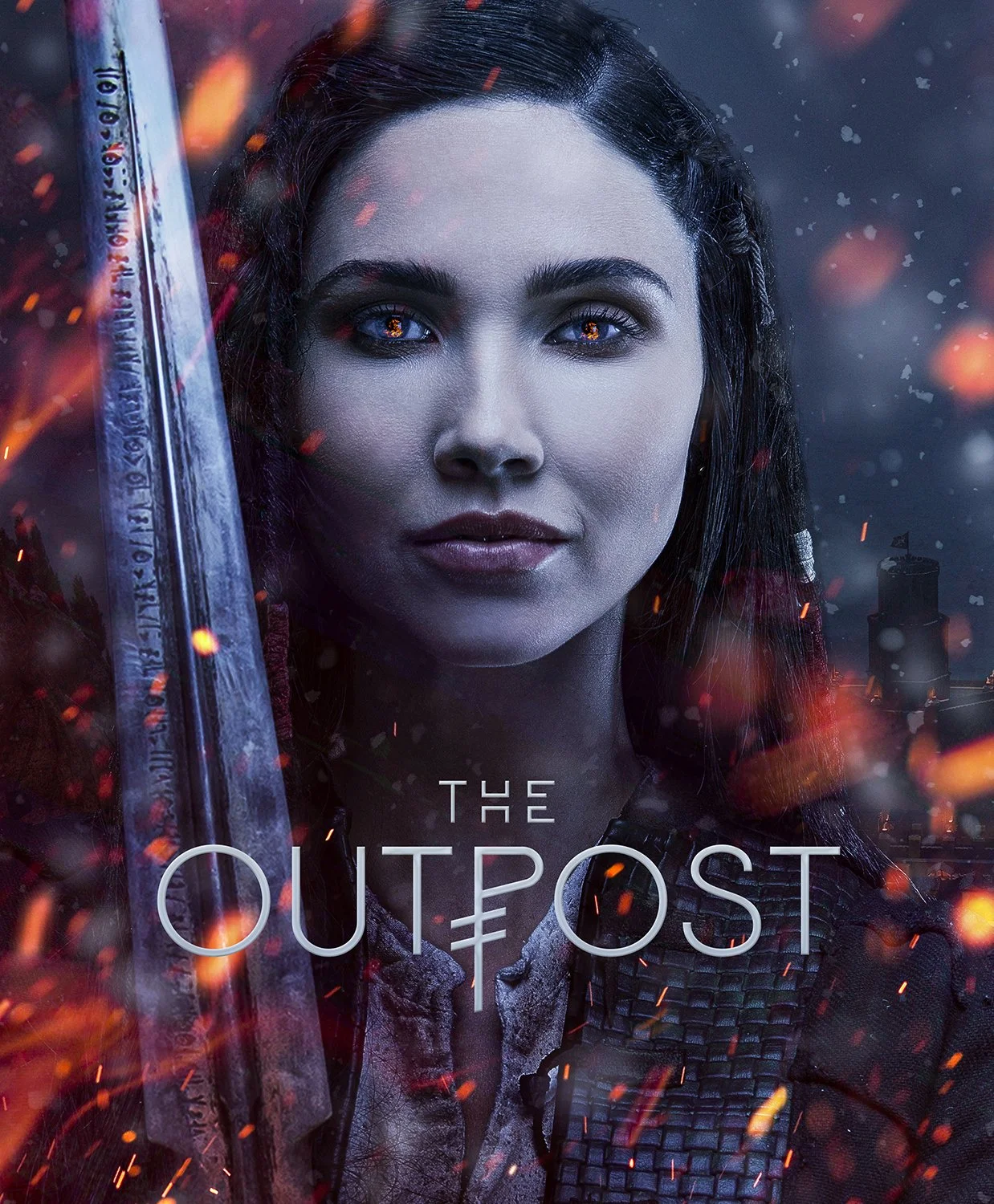 Close-up of a woman with dark hair and intense eyes holding a sword, with flames and a dark cityscape in the background. The title 'The Outpost' is displayed text on the image.