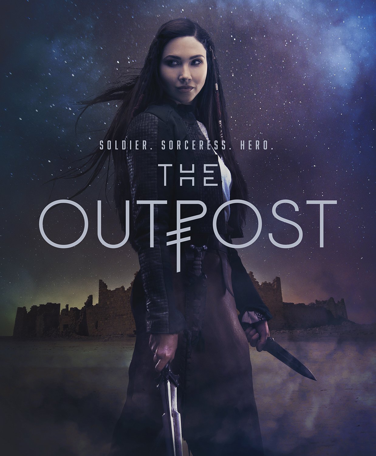 A woman with long dark hair, holding a knife, standing in front of a starry night sky and ruins, with the title 'The Outpost' and the words 'Soldier. Sorceress. Hero.' displayed on the image.