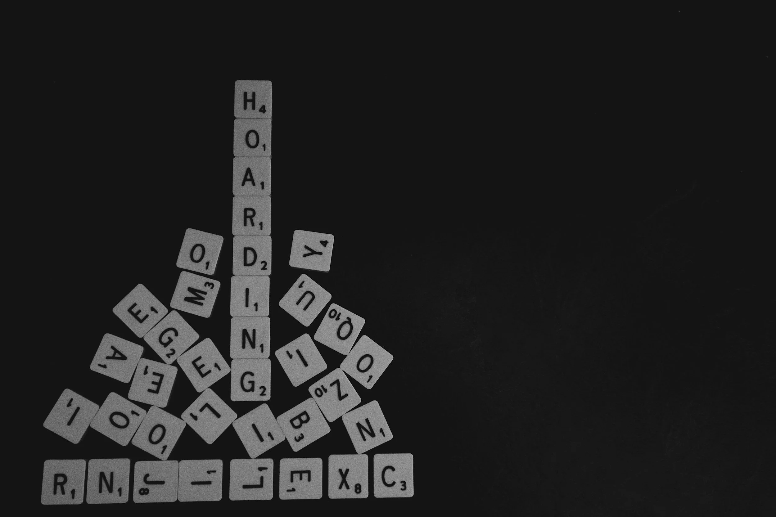 Scrabble tiles spelling out a word, illustrating verbal reasoning test preparation for the 8 Plus