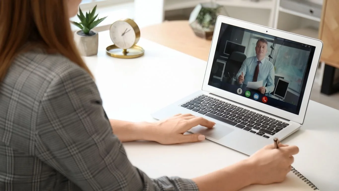 Candidate completing an online law firm vacation scheme interview as part of the assessment centre and application process
