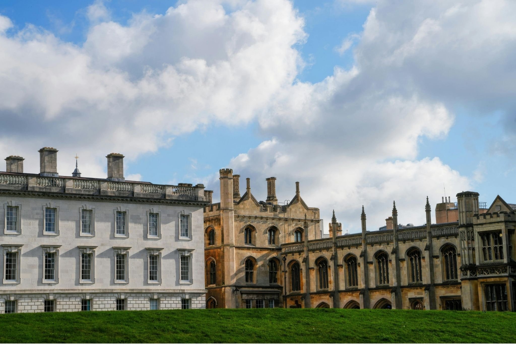 Students studying the Education degree at the University of Cambridge outside a historic Cambridge college