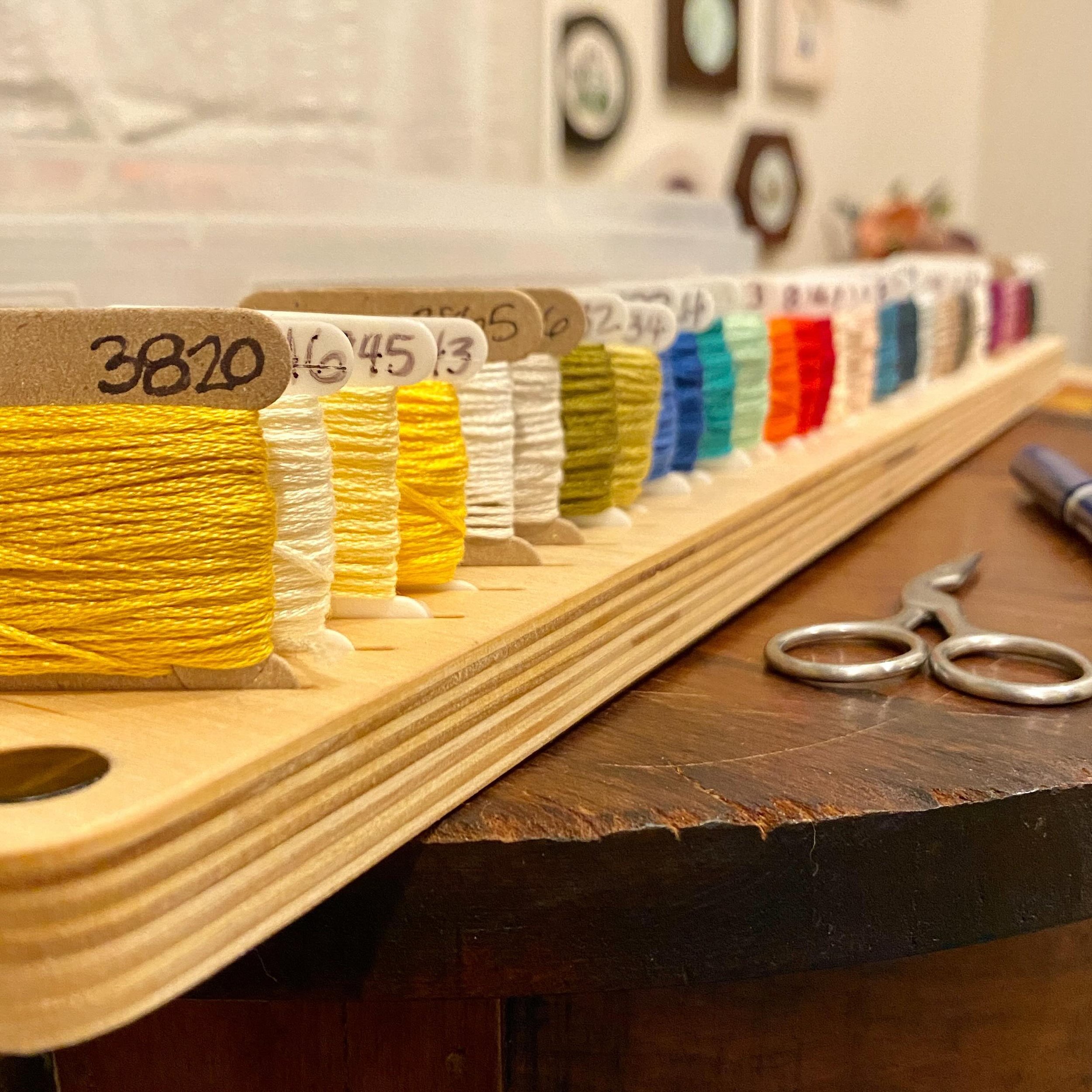 Now that&rsquo;s a lot of bobbins! 30, to be exact. 

I&rsquo;m bringing this along to @hhamericas in Chicago next week, where someone in the exhibit hall will get to take it home. 

What would you do with a mega-long bobbin rack? Do really big proje