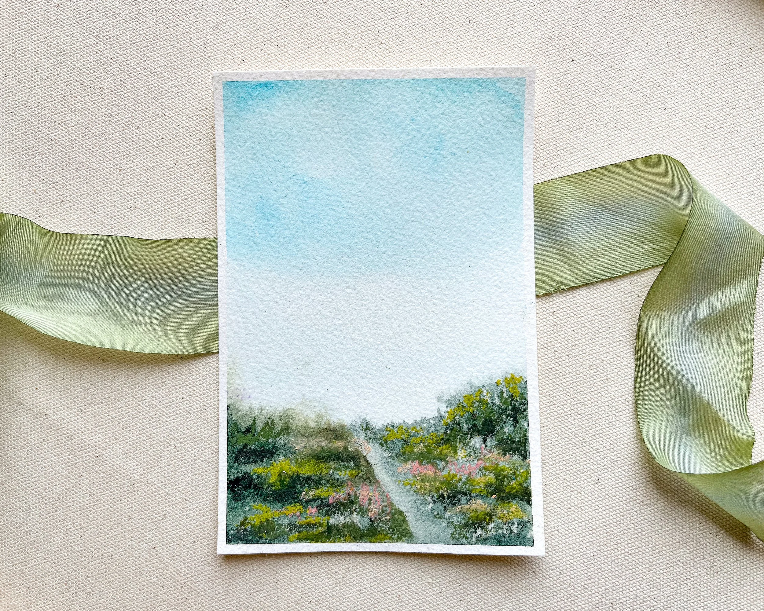 Original mixed media landscape painting with pastel wildflowers.