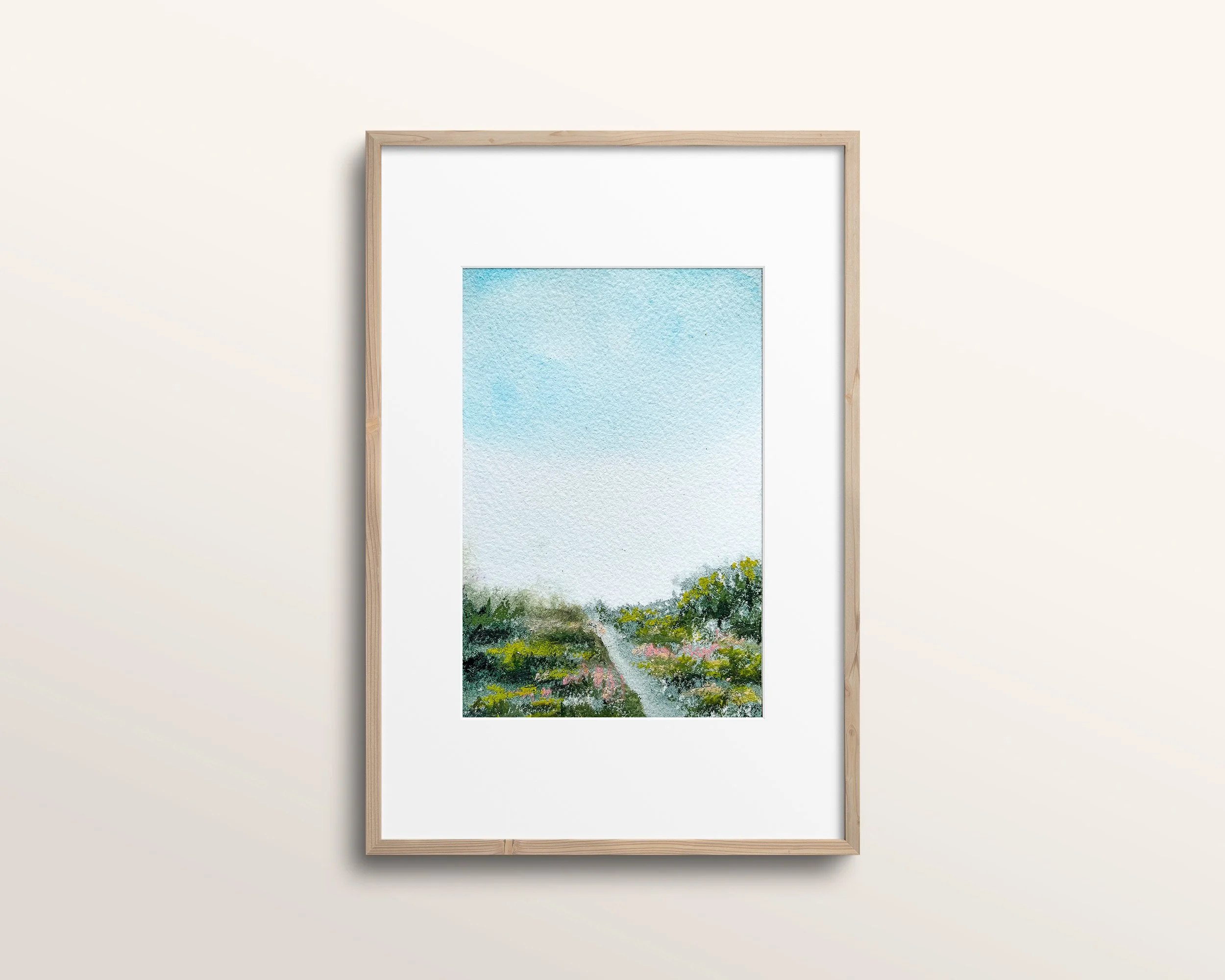 Mixed media landscape painting in watercolor with pastel expressive wildflowers in wooden frame with white mat.