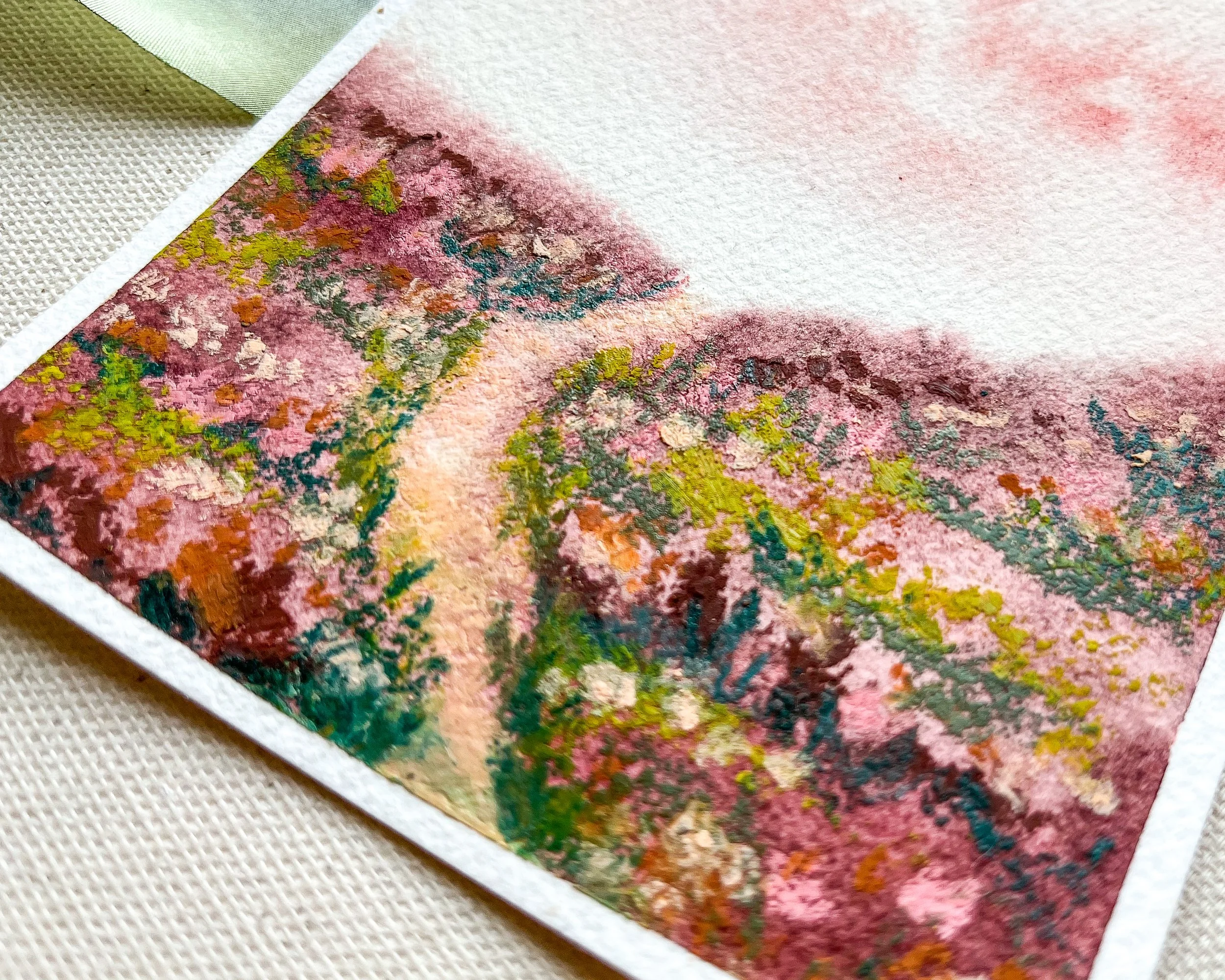 Detailed image of the pink pastel mixed media landscape with loose, expressive flowers