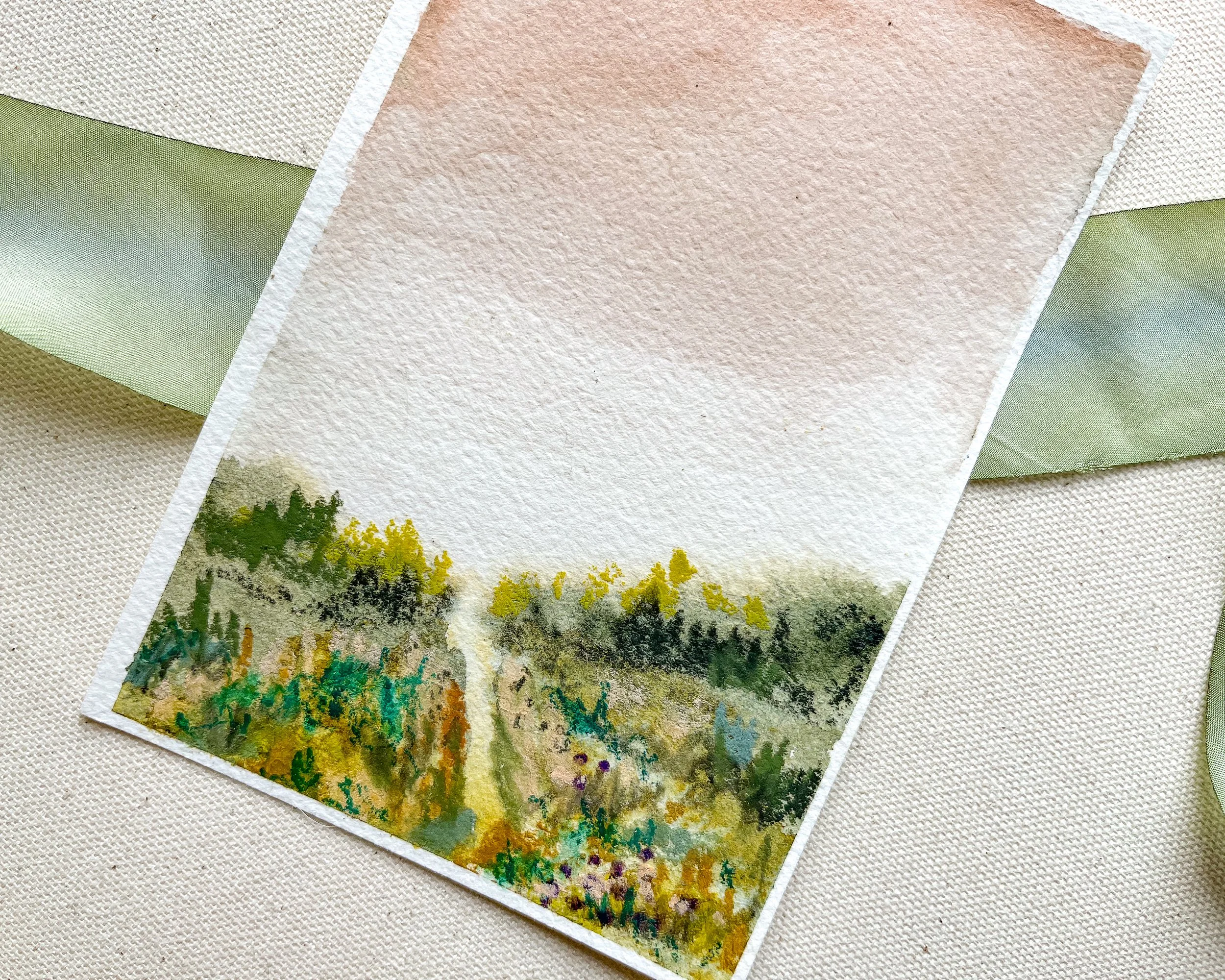 Close up detail of mixed media landscape at sunset