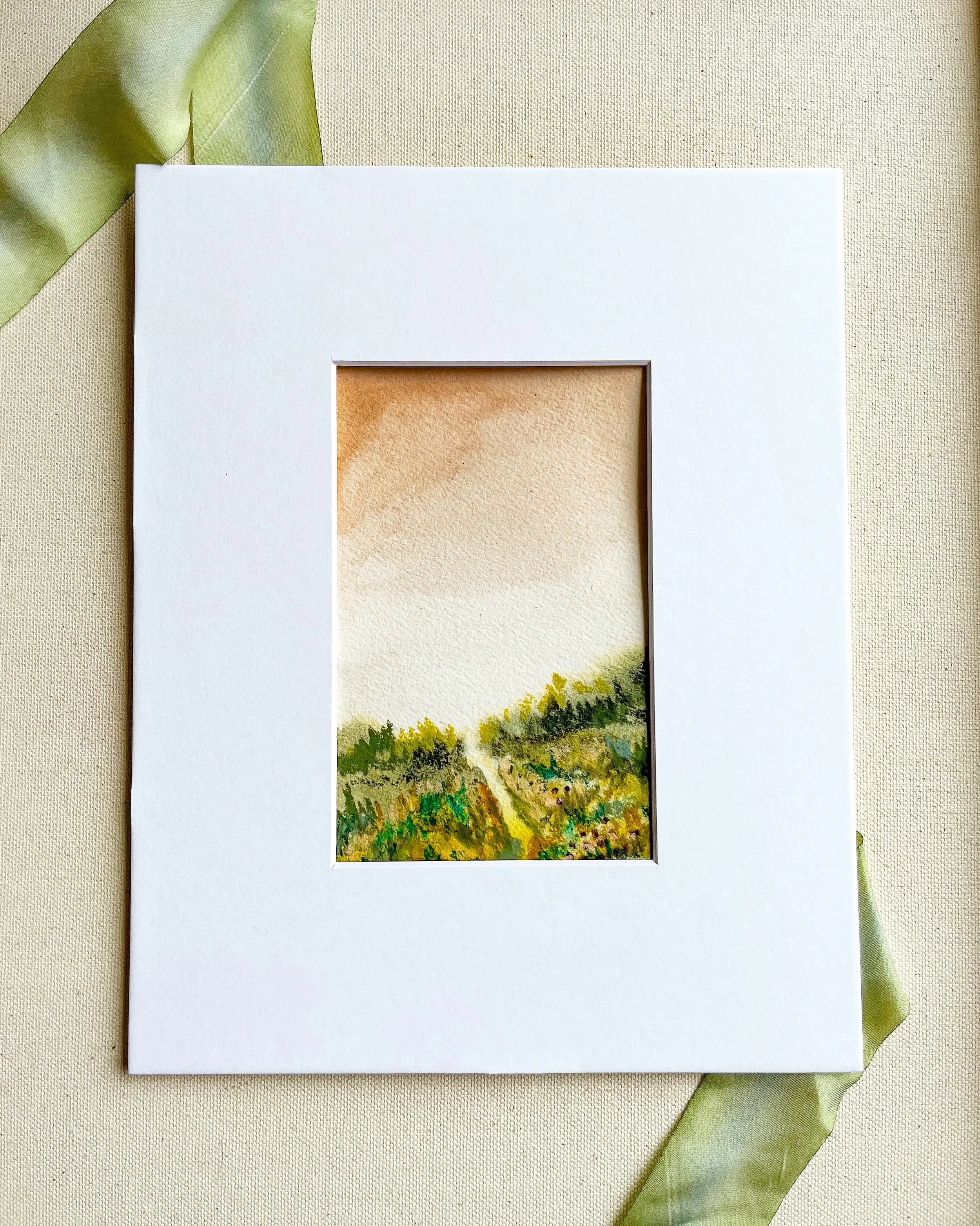 Mixed media landscape painting at sunset shown in optional white 8" x 10" mat