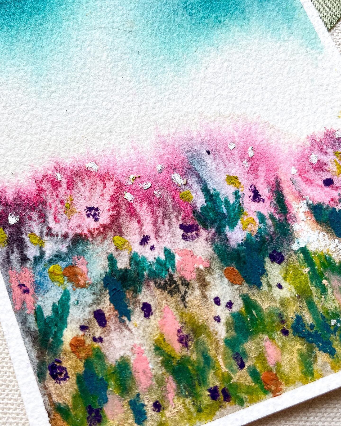 Landscapes Day 9/12: Untamed. Abstract flowers and greenery reach up toward an open sky. In this painting I let the watercolor flow and the pigments stretch towards each other. Layers of pastels dot and float across the landscape, and it&rsquo;s not 