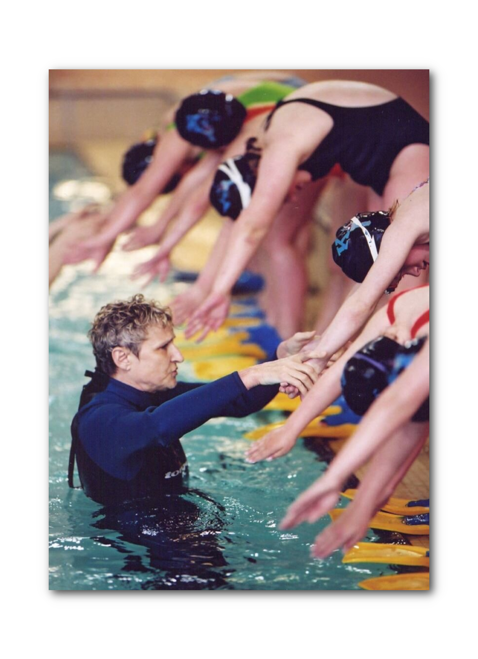Coach Monika training young athletes in swim technique physical literacy
