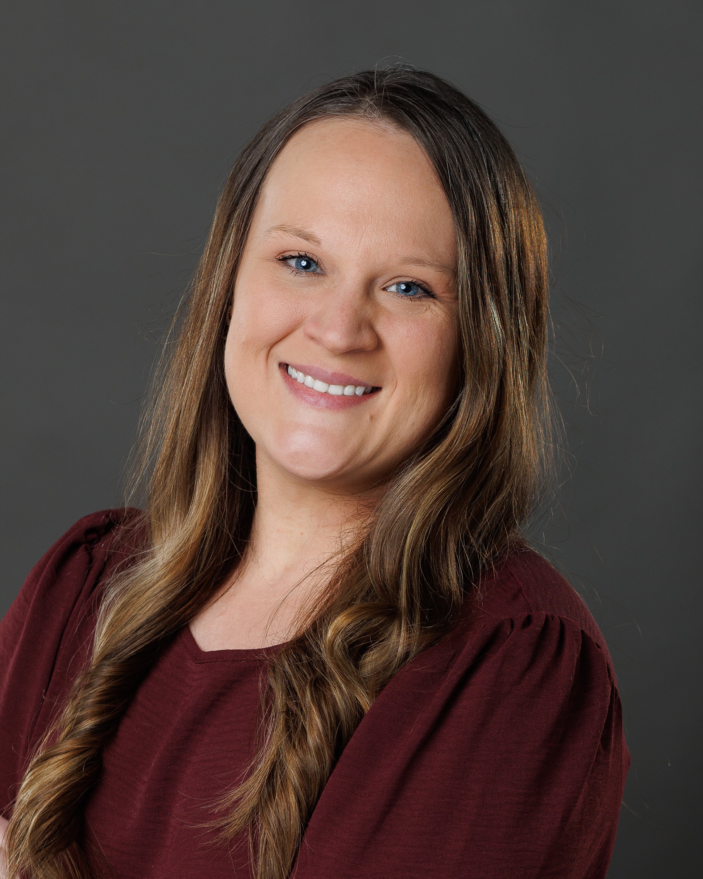Studio headshot of a women in rice lake, wi by seasons photography.