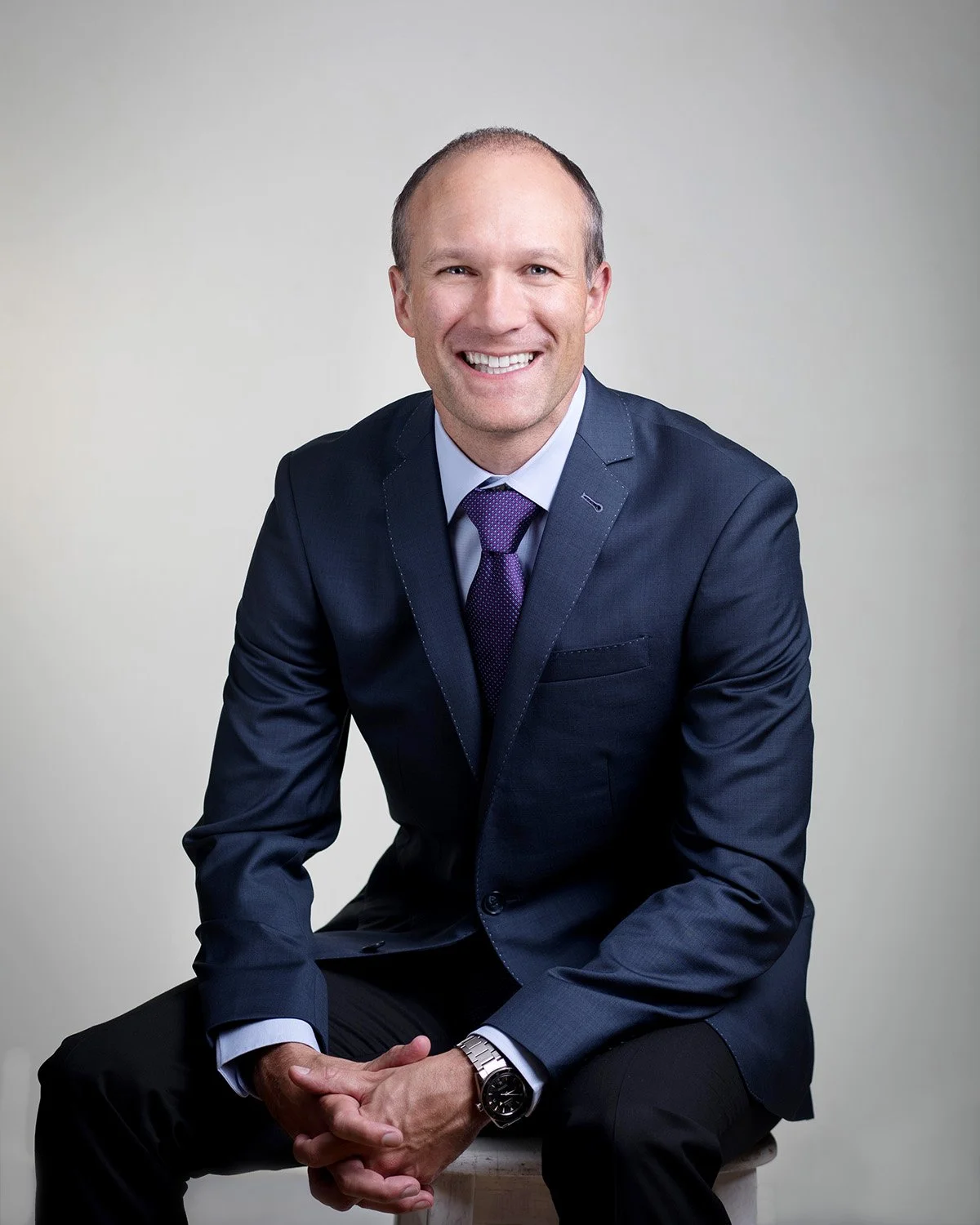 A tailored suit jacket is great for professional headshots.