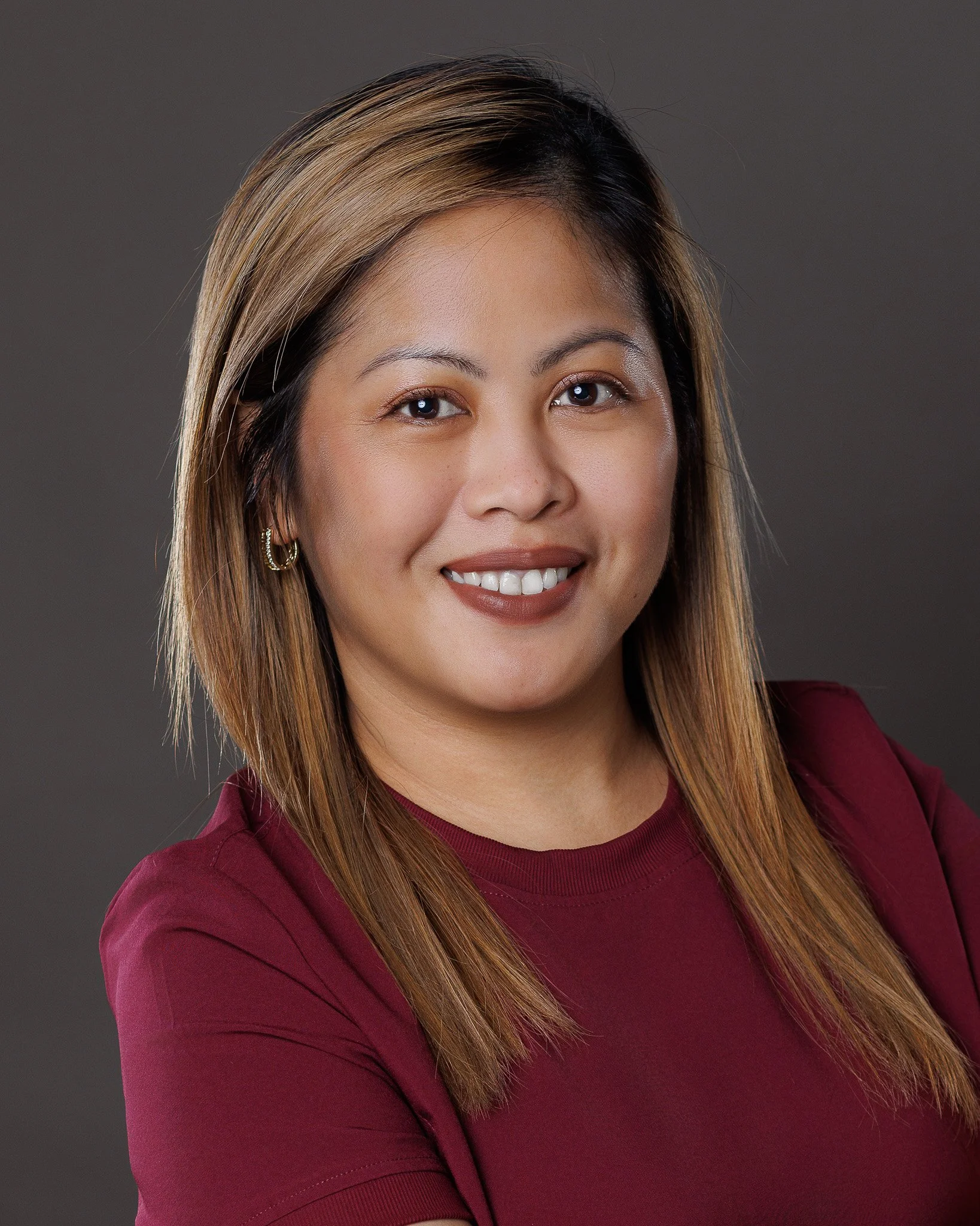 Professional portrait of a young women manager in Rice Lake, WI.