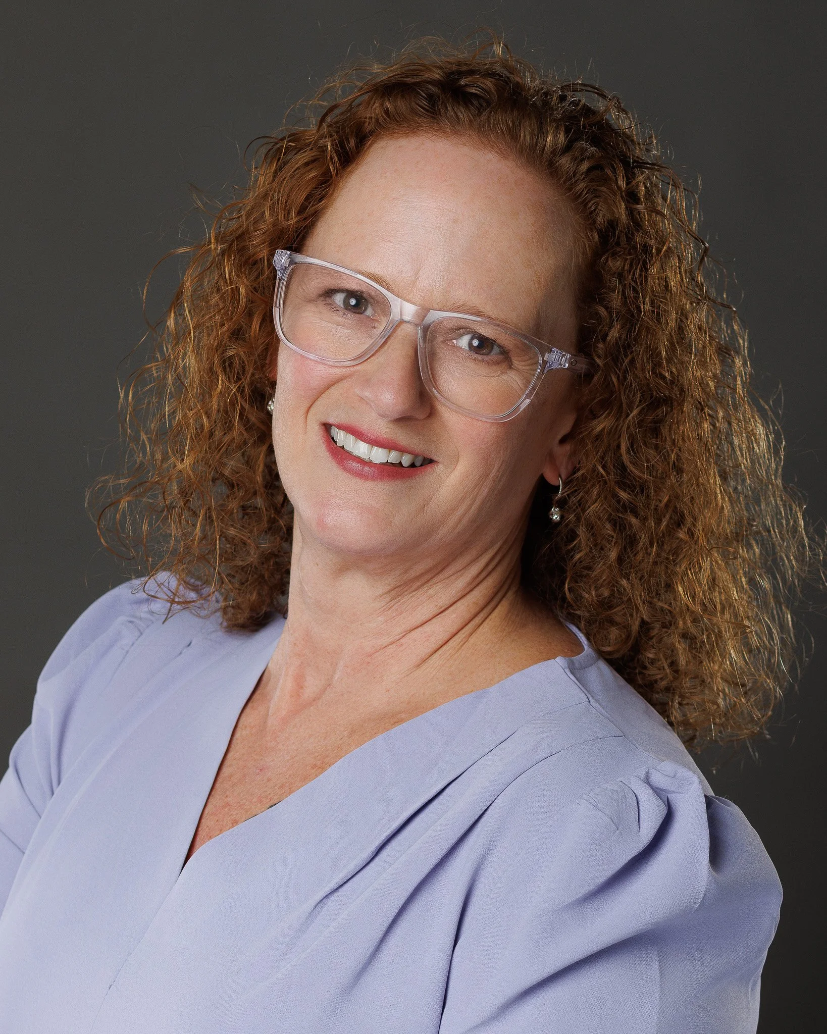 Efficient 30-minute professional headshot session for busy executives in Rice Lake, WI.