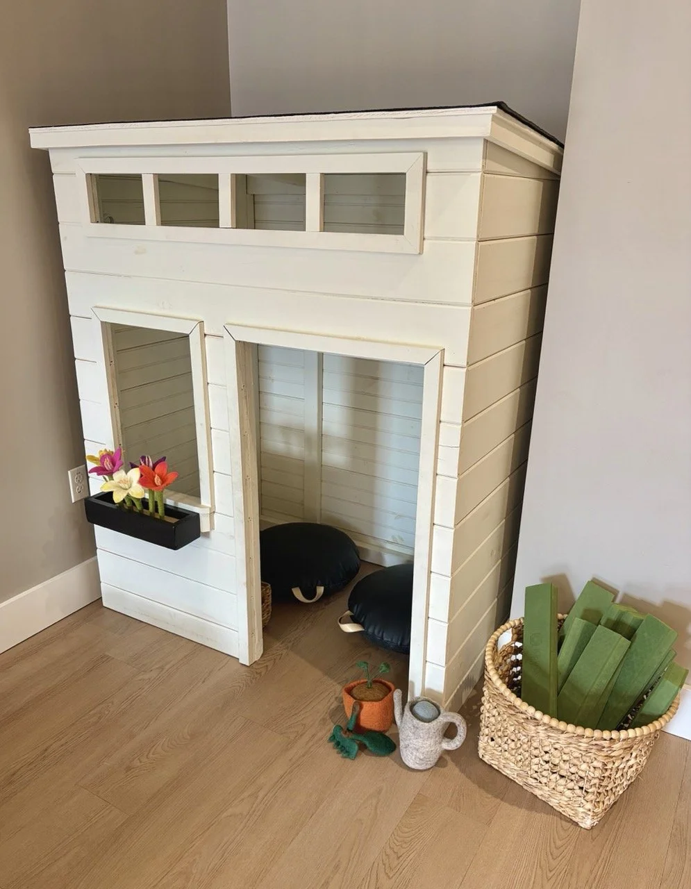 kids playhouse and toys in reception area