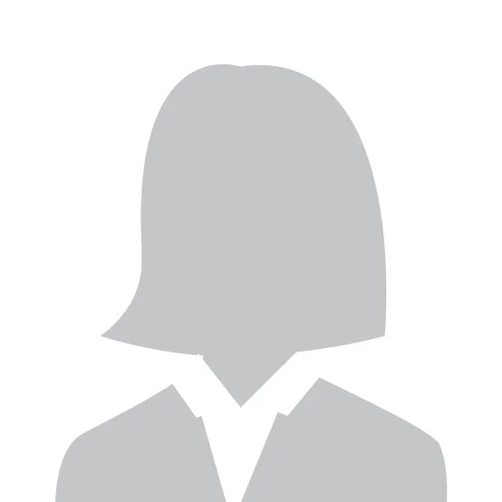 Silhouette of a woman with shoulder-length hair wearing a blazer or jacket.