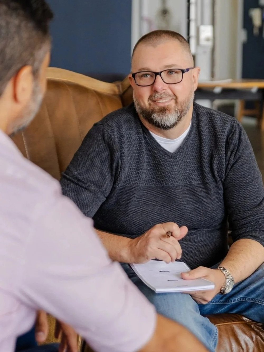 Shane Williams, technology adviser, in conversation with a family business owner