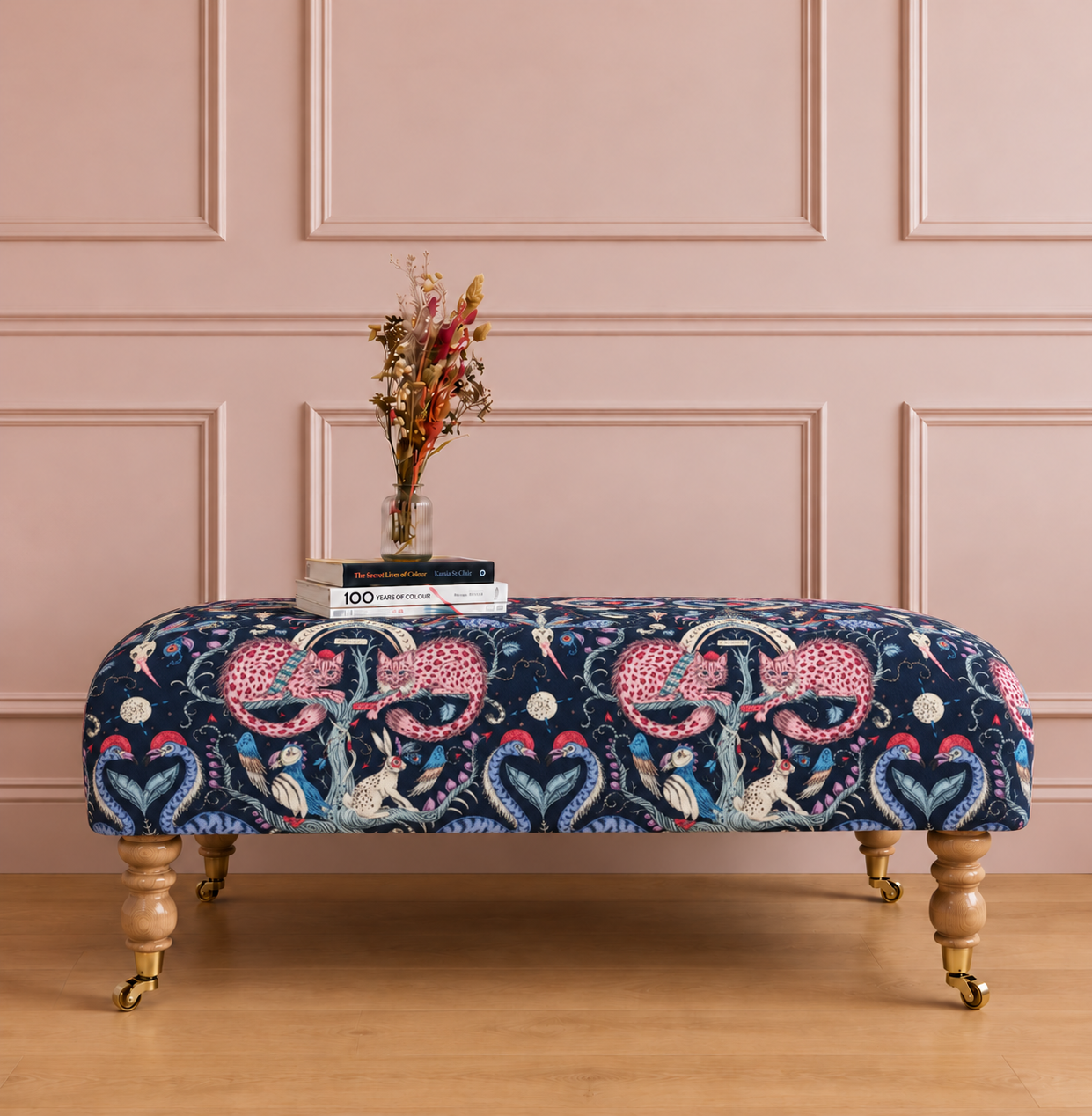 Navy cat-and-bird footstool upholstery.png