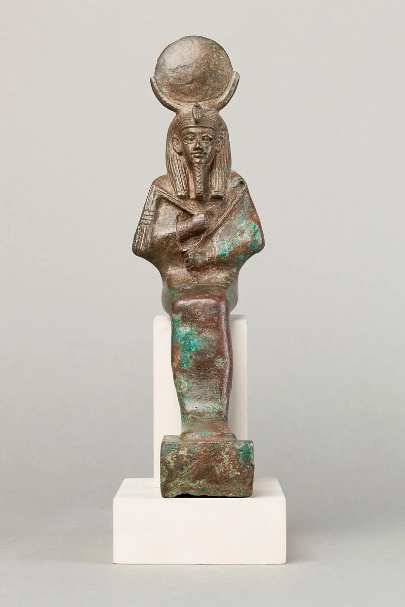 Osiris-Iah wearing a crown that symbolizes all phases of the moon 