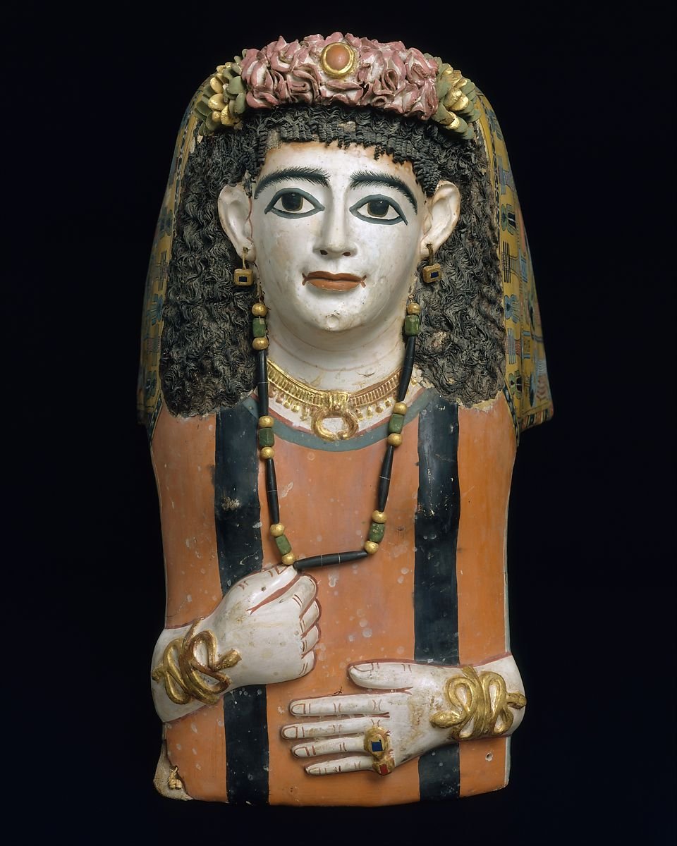 Mummy mask, wearing a crescent-shaped pendant called a lunula 