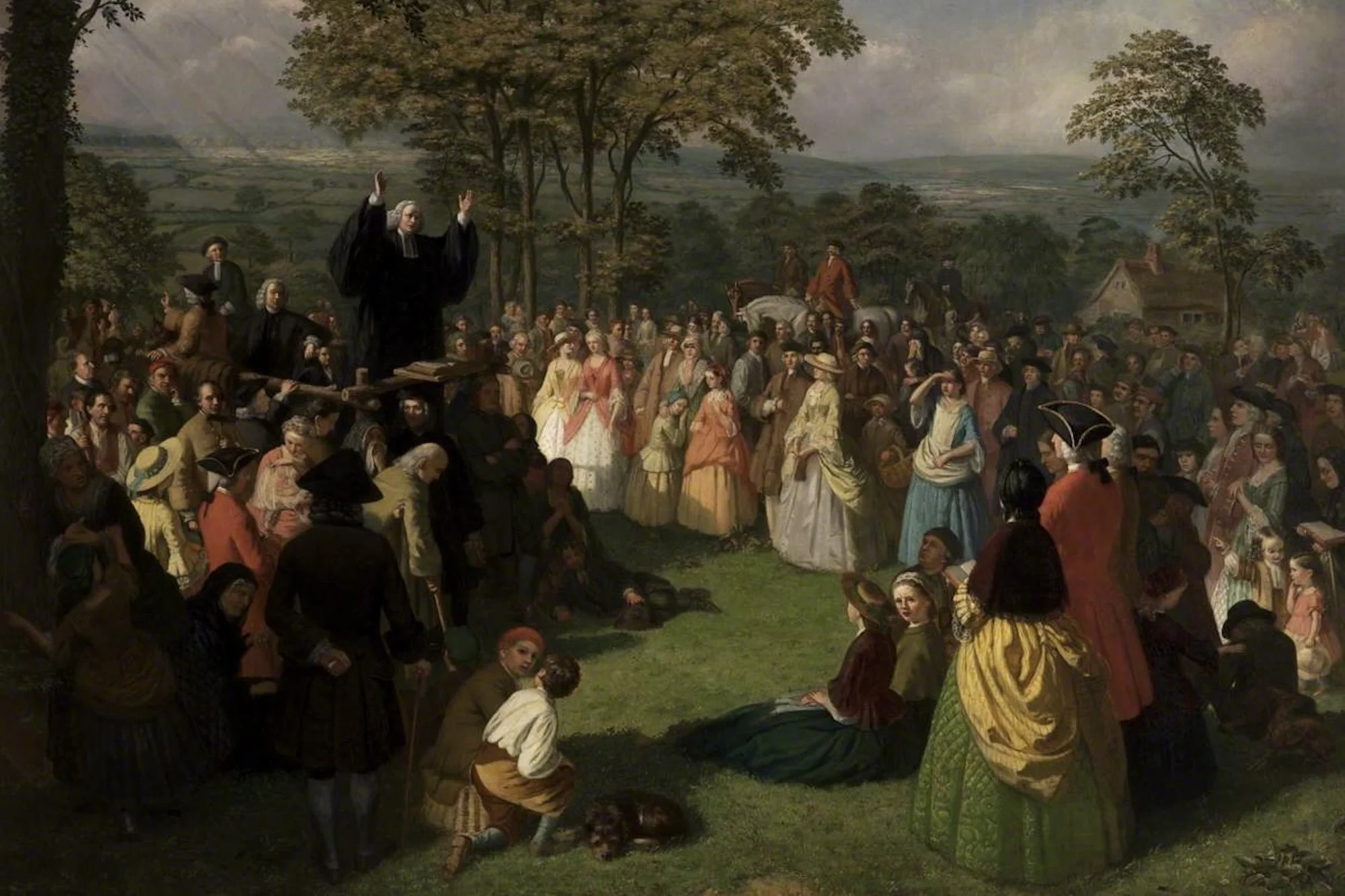 painting of George Whitefield preaching to a crowd in a field