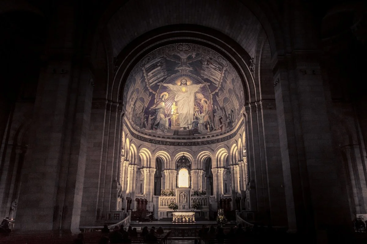 altar area of a cathedral representing the Catholic church