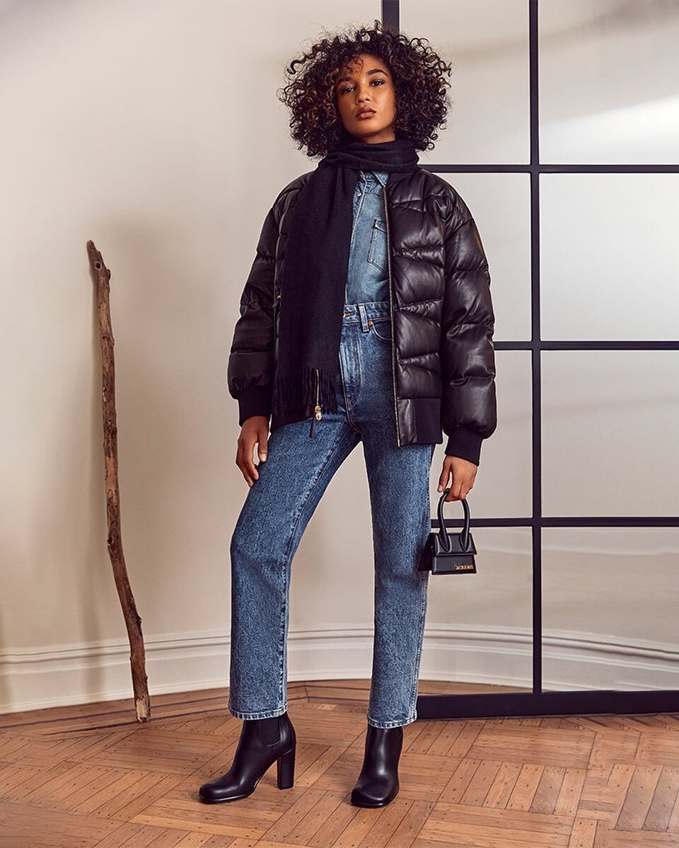 Our friends from @saks all layered up.
.
.
.
Puffer: @khaite_ny 
Shirt: @nililotan 
Jeans: @khaite_ny 
Bag: @jacquemus 
Boots: @bottegavenetaworld 
.
.
Photo: @saks 
Location: @localhaus