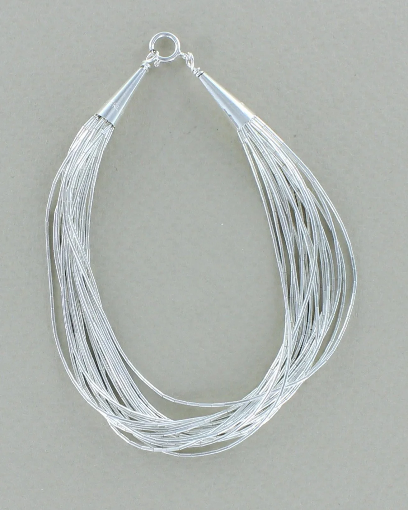 20 Strand Liquid Silver Bracelet
