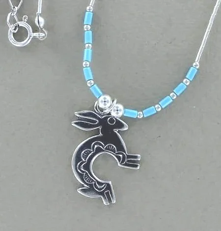 Stamped Sterling Silver Rabbit Pendant on Liquid Silver Necklace
