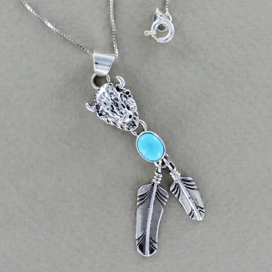 Navajo silver buffalo pendant with 2 feathers