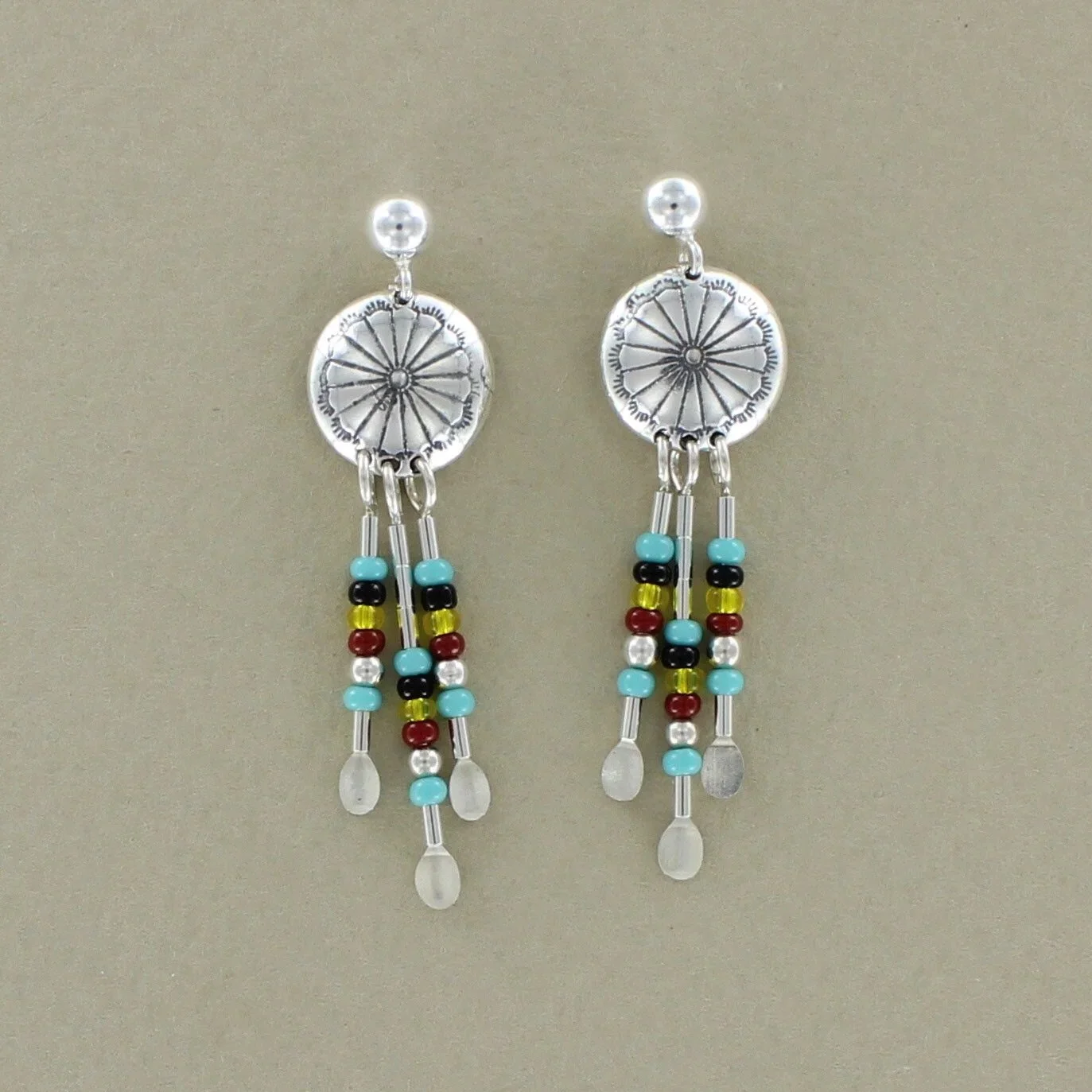 Stamped silver conch with three seedbead tassles earring