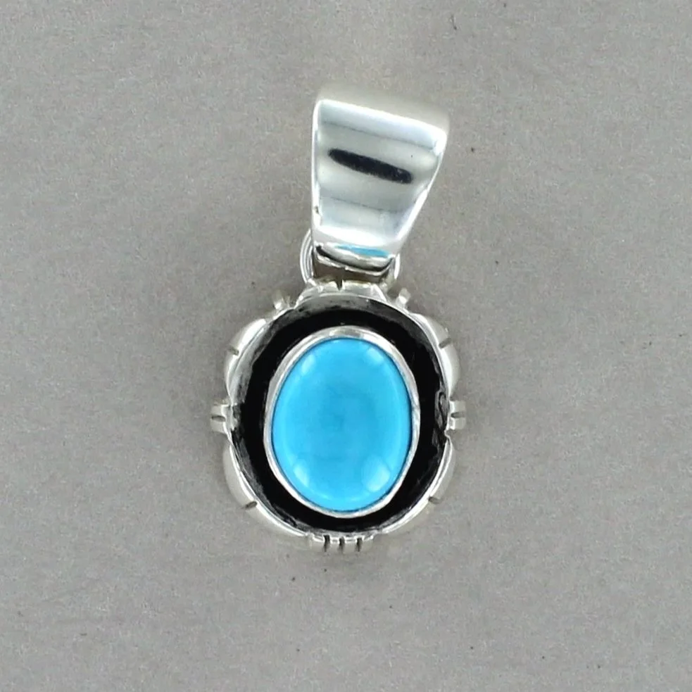Sleeping Beauty Turquoise Pendant by Navajo Artisan Ben Jimenez