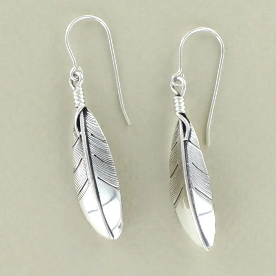 Lena Platero - hand cut feather drop earring