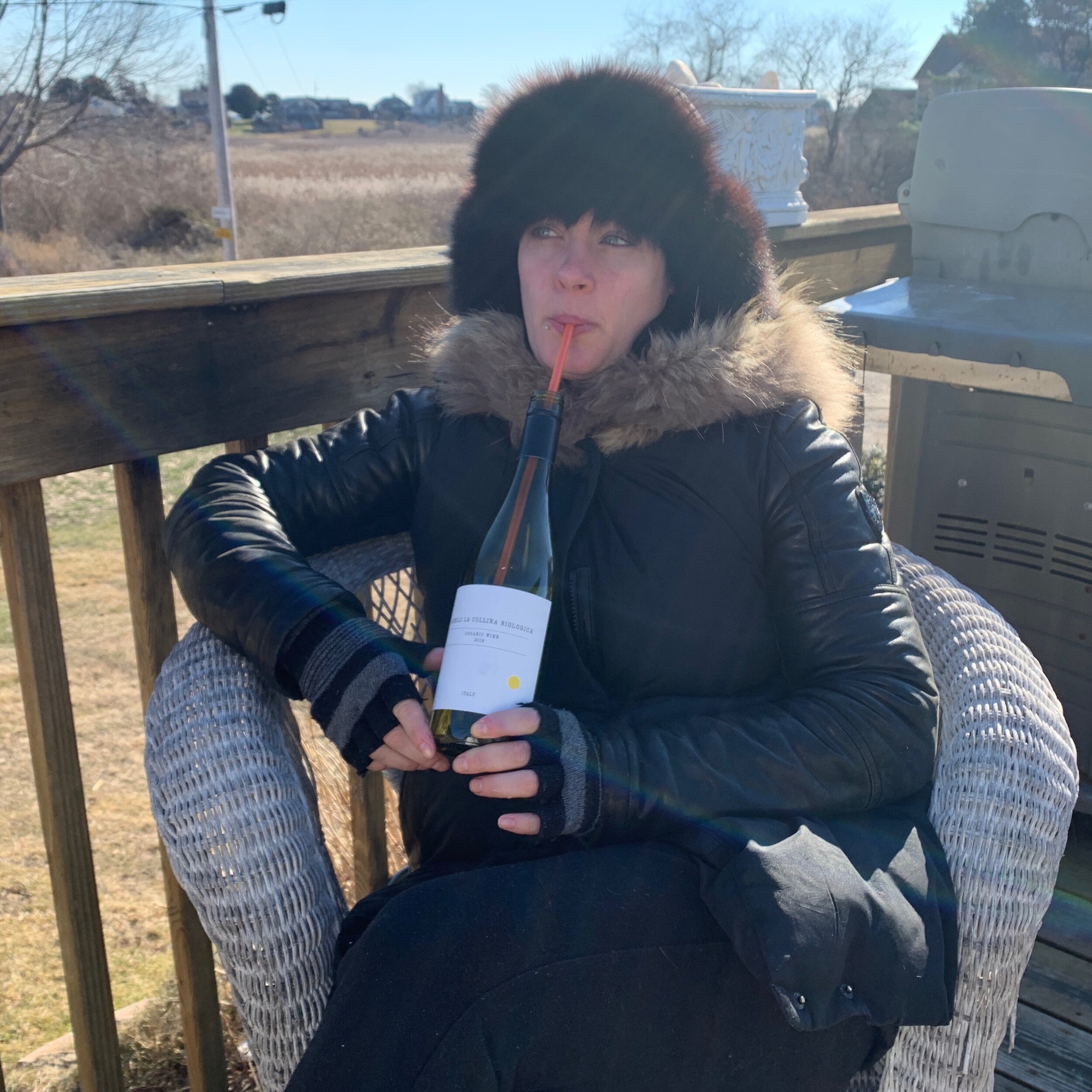 Woman Drinking Wine With Straw