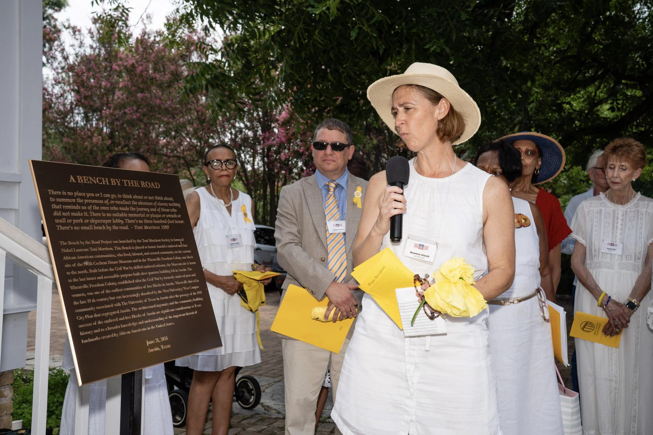Reading the plaque.