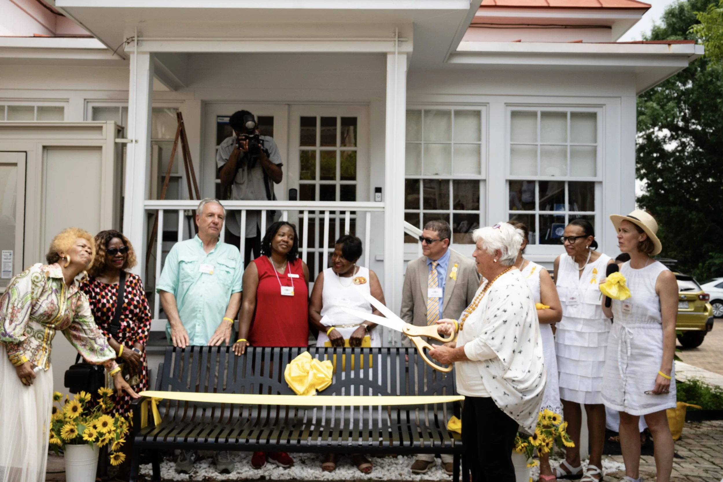 The team behind the bench for the ribbon-cutting.