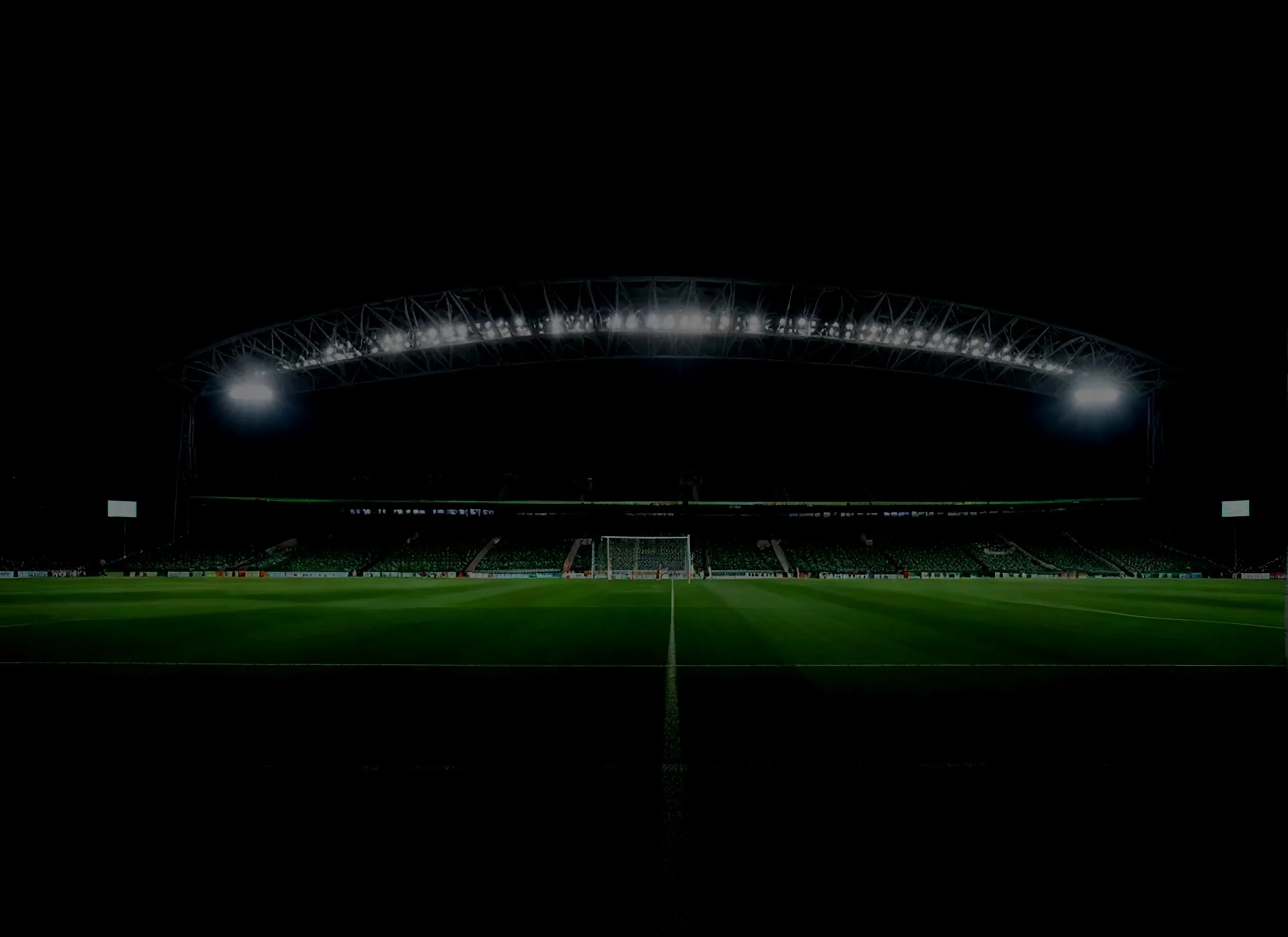 stadium_with_green_stadium_with_white_sign_that_says_word_side.jpg