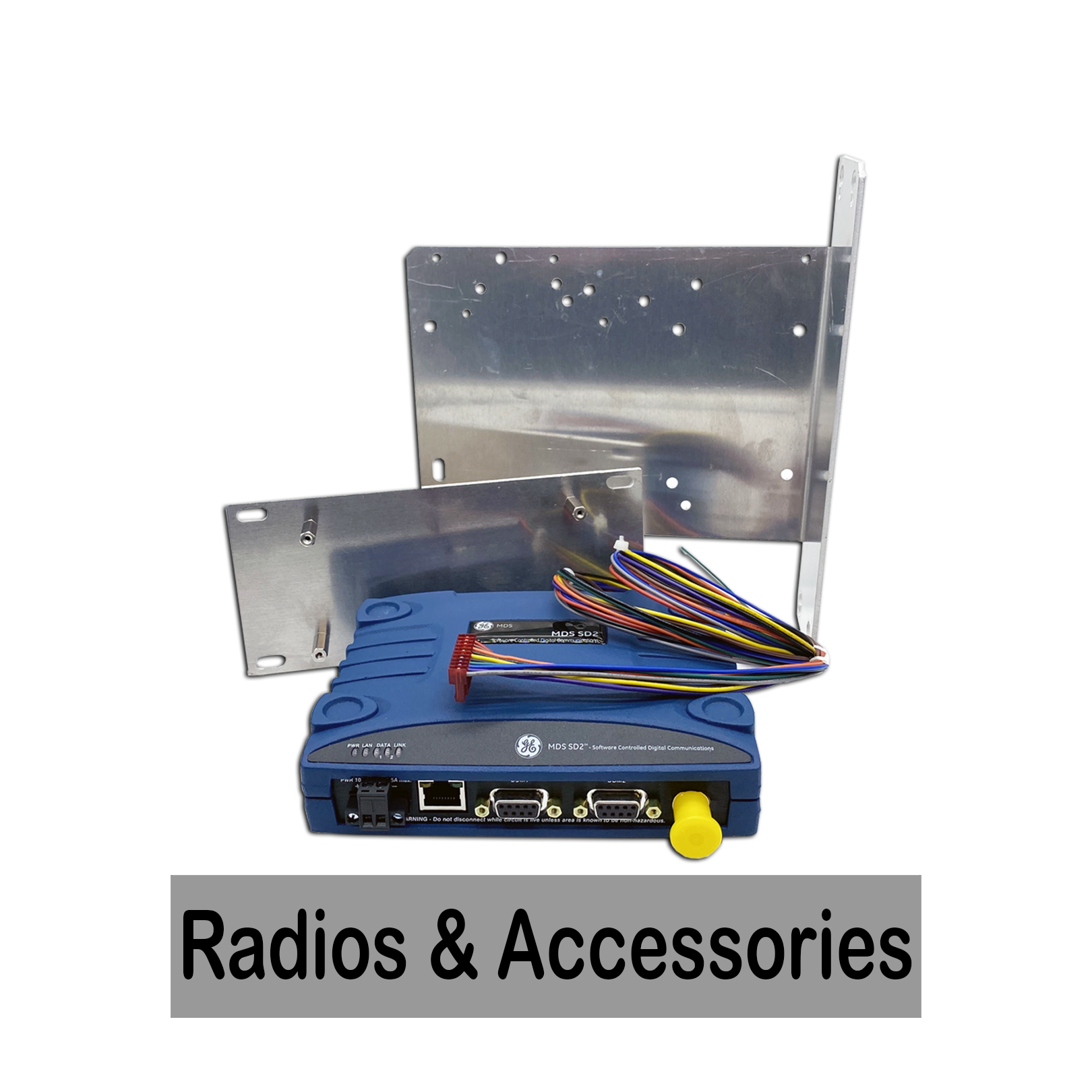 Electronic device with wires, mounted inside a metal frame, with a label reading "Radios & Accessories".