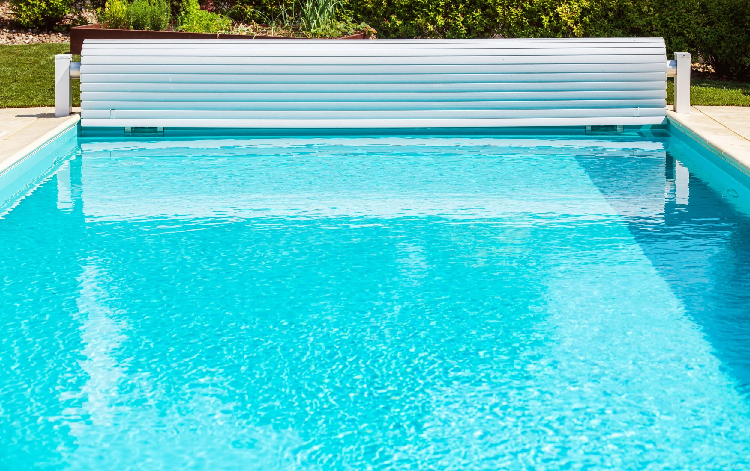 How Pool Covers Keep Your Pool Clean and Heated