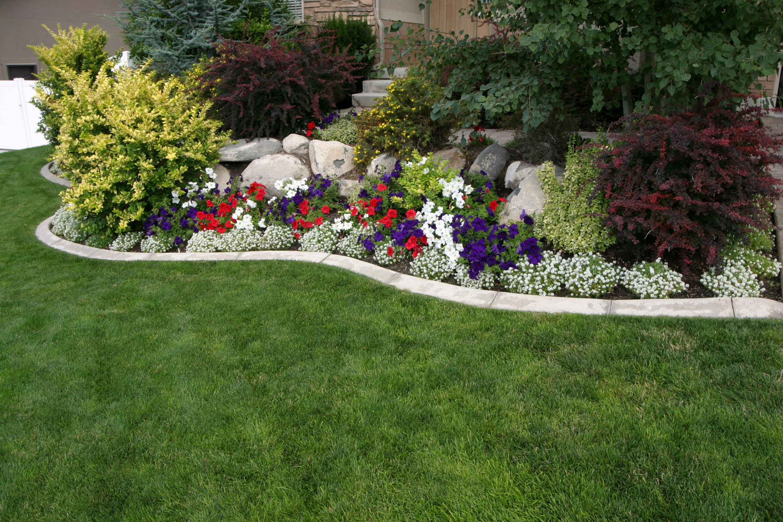 Lawn and Garden Maintenance: Keeping Landscaping Lush in Summer