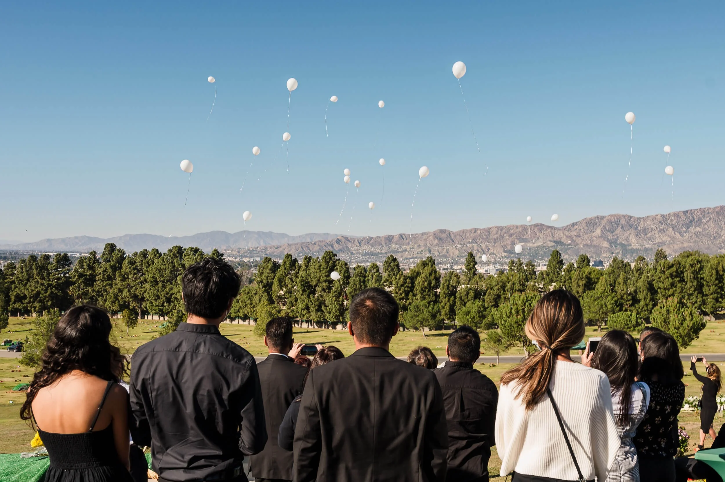Balloon release during graveside service at Forest Lawn Hollywood Hills