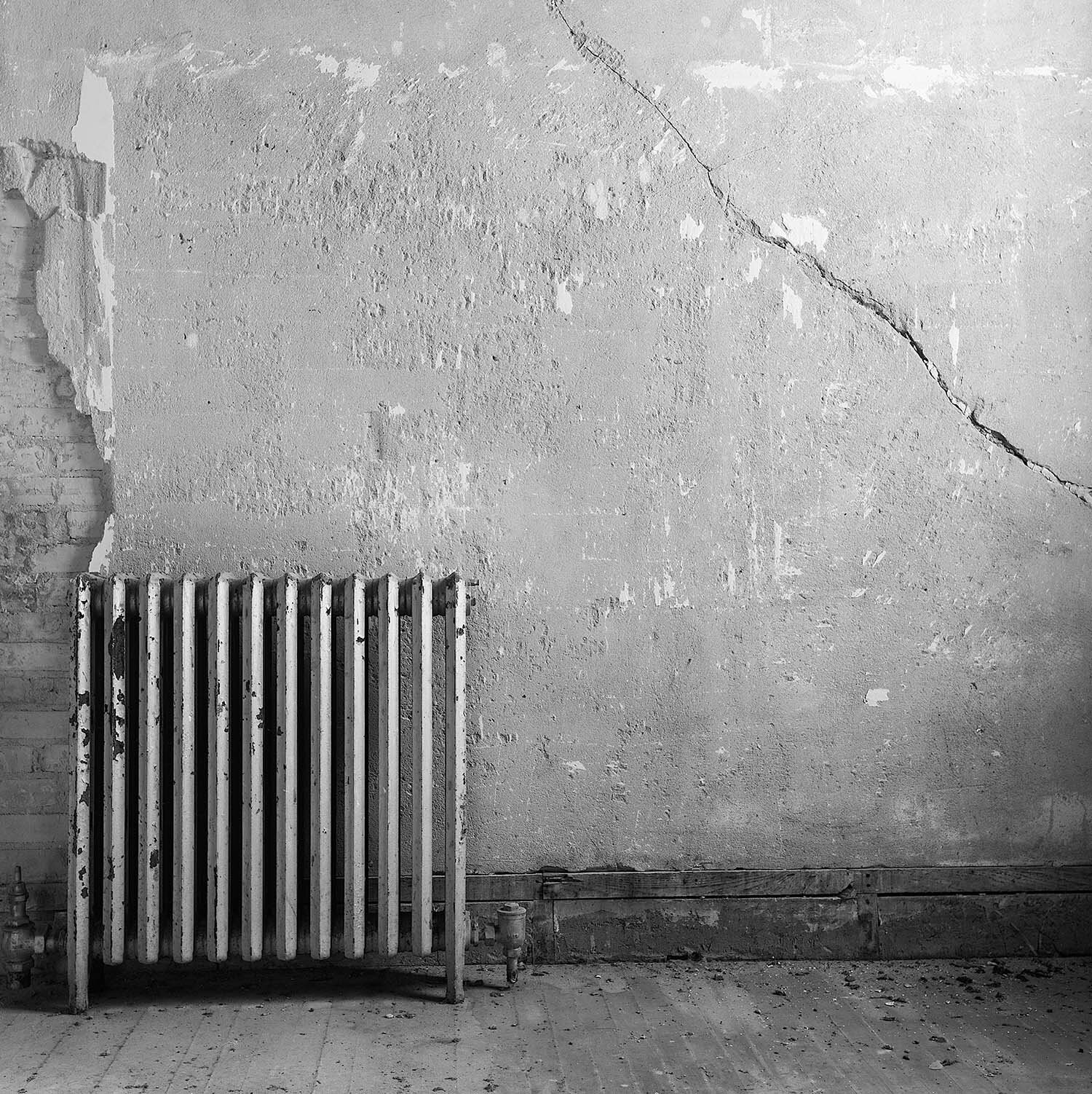 Radiator and Cracked Wall
