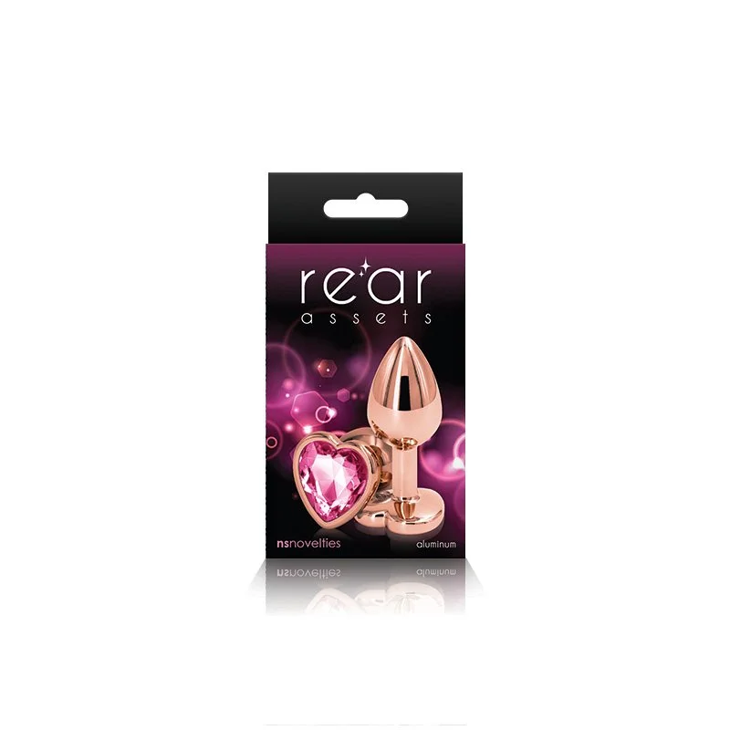 Purple box packaging showing item on front - Rose gold aluminum butt plug with heart-shaped base accented with pink jewel on bottom.
