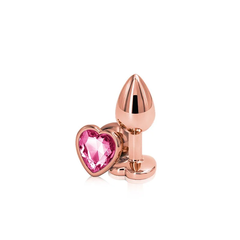 Rose gold aluminum butt plug with heart-shaped base accented with pink jewel on bottom.