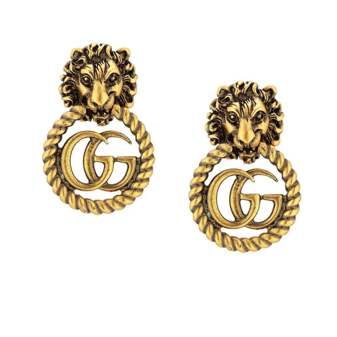 Gucci Lion Head Earrings, $650 at Farfetch