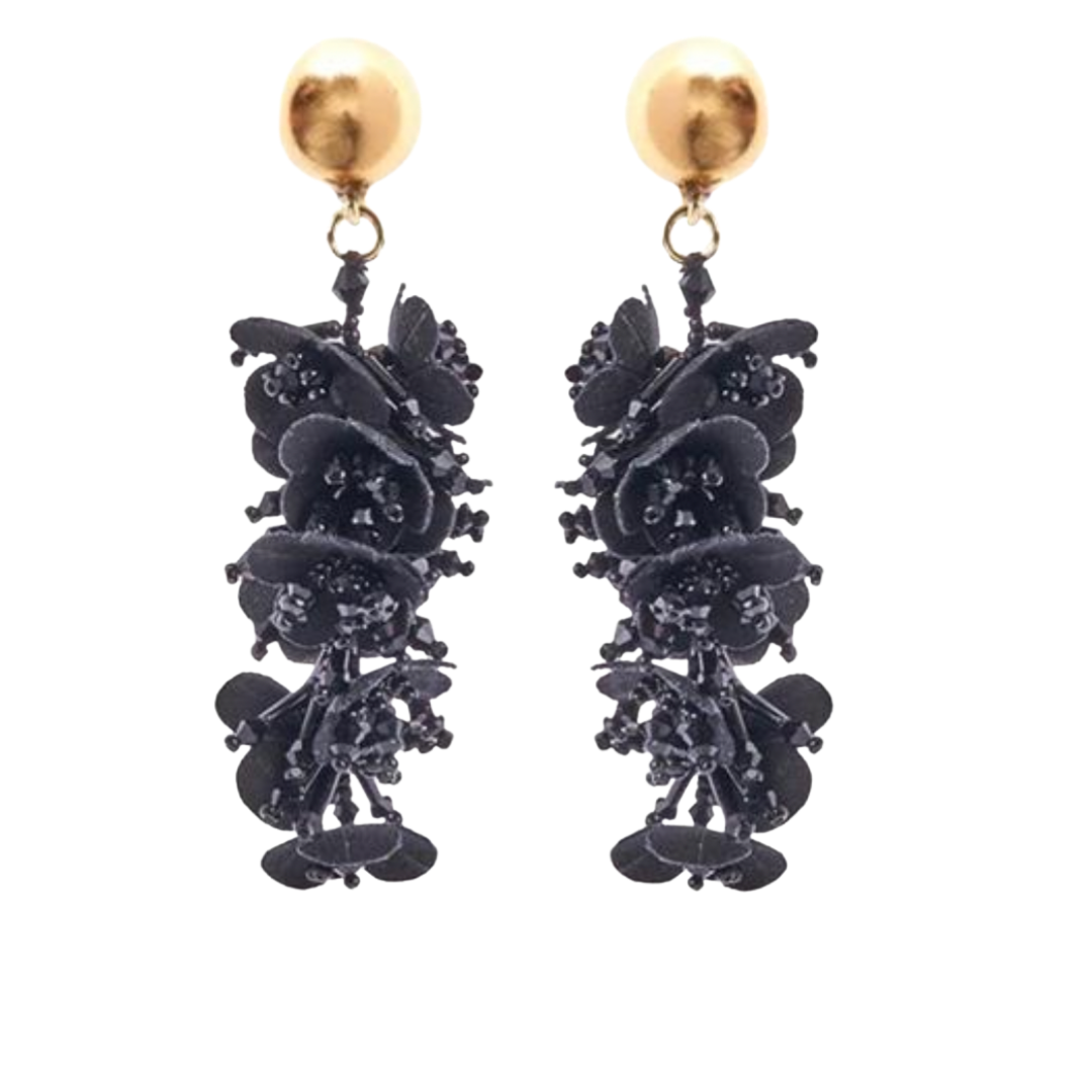 Oscar de la Renta “Jasmine” flower earrings, $390 at Oscar de la Renta